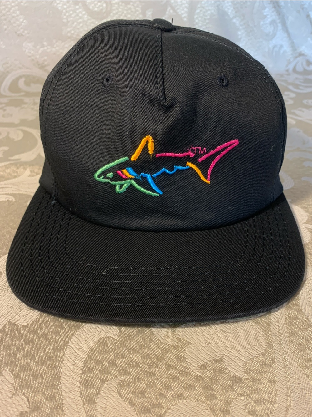 Greg Norman Collection Black Hat with Multicolor Shark Logo